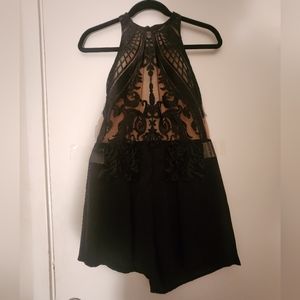 Semi-sheer black party romper